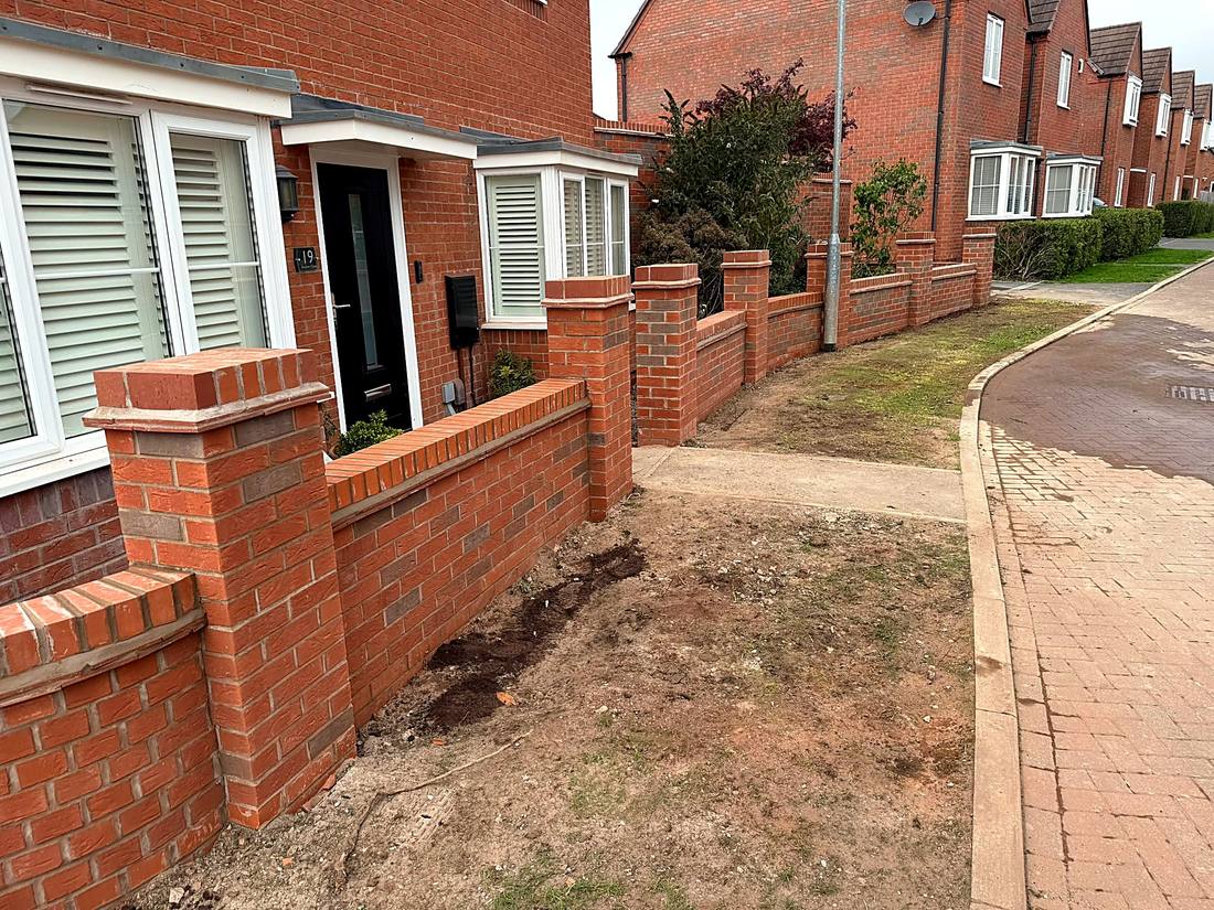 New front garden wall with brick piers and coping