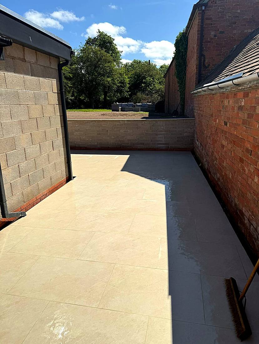 Porcelain side patio between extension and boundary wall